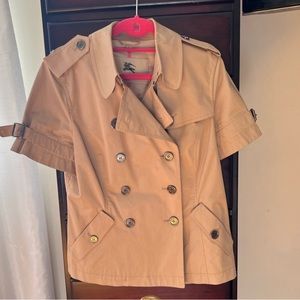 Burberry short sleeve tan  trench jacket.